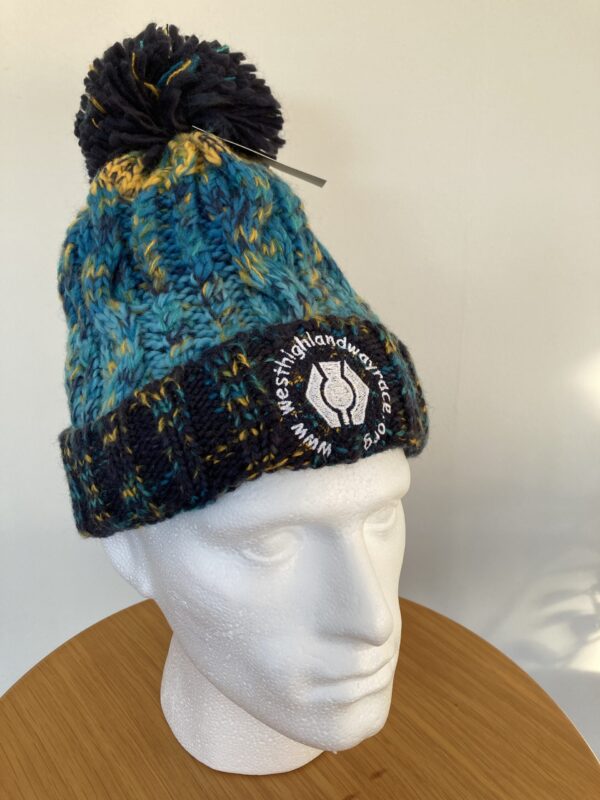 NEW! ADULT WEST HIGHLAND WAY POM POM BEANIE. Marine Splash